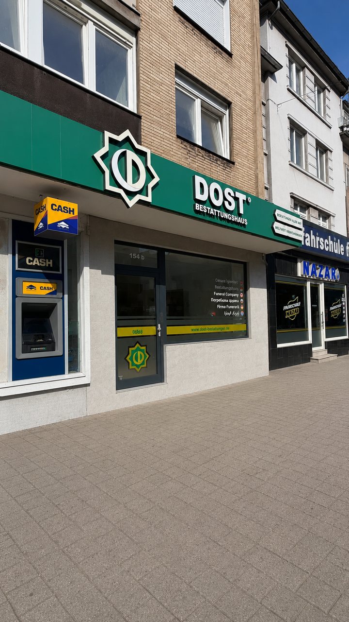 Außenansicht mit Dost-Schild